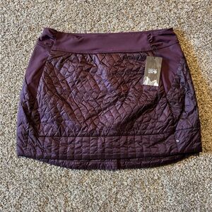Mountain Hardwear Women's Quilted Puffer Mini Skirt in Deep Purple